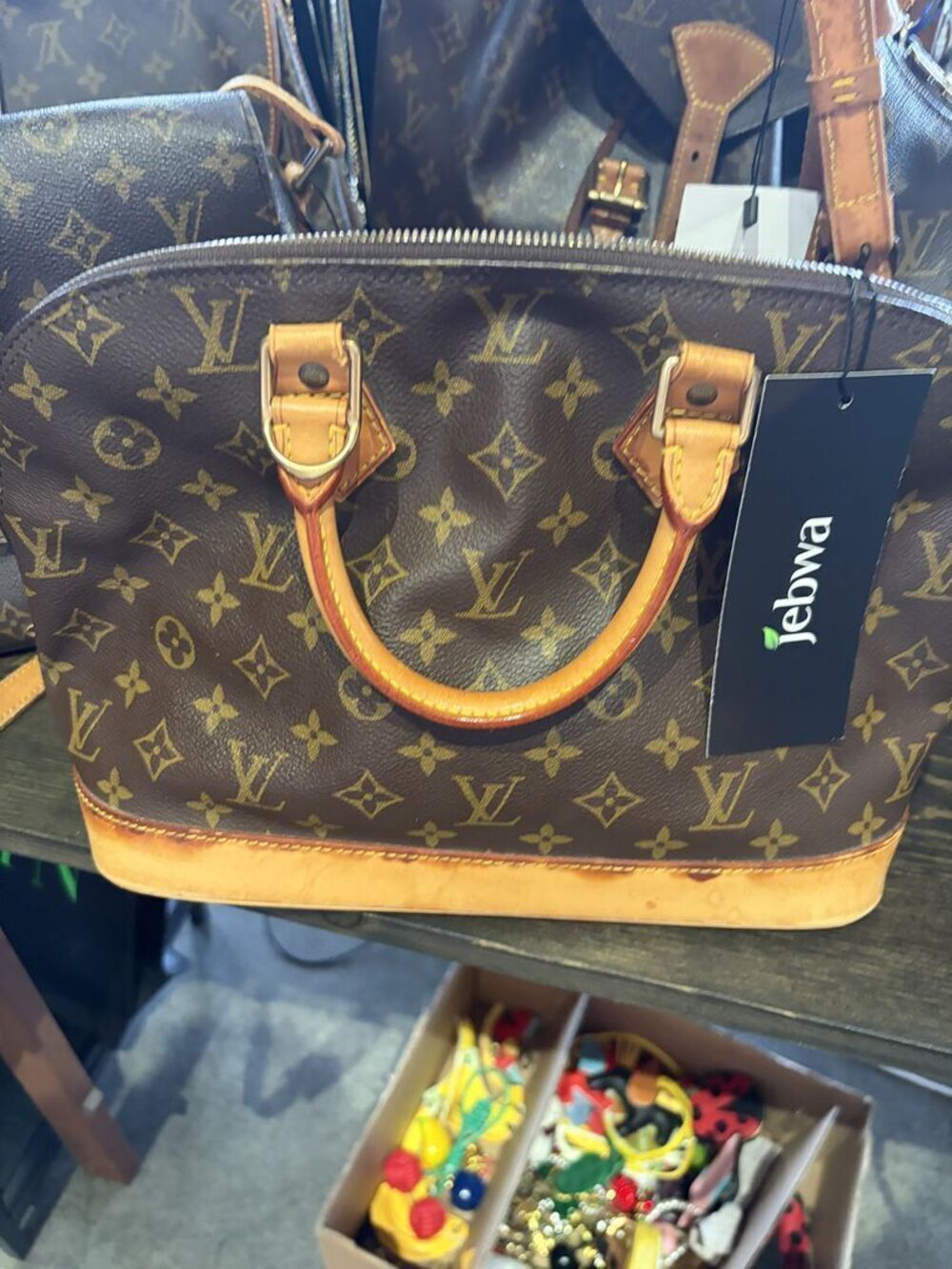 Louis Vuitton Monogram Alma PM Handbag